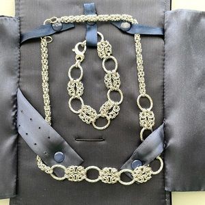 Silver necklace and bracelet set.